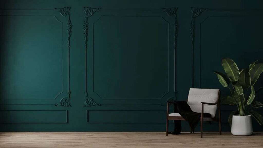 Dark green accent wall with detailed trim work and smooth painted finish by a house painter in Franklin, MA