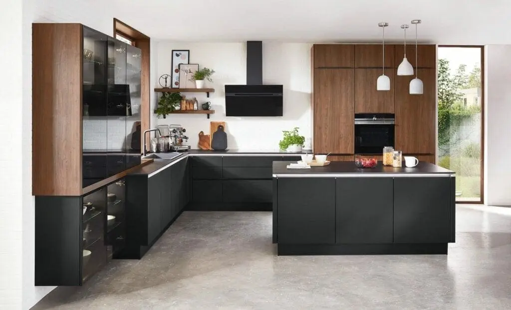 Modern kitchen with matte black cabinetry and sleek contemporary finishes by a painting company in Southborough, MA